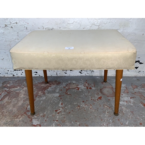 81 - A mid 20th century Sherborne white vinyl dressing table stool - approx. 43cm high x 37cm wide x 57cm... 