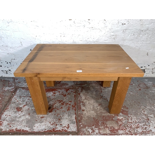 83 - A modern oak rectangular coffee table - approx. 51cm high x 62cm wide x 91cm long