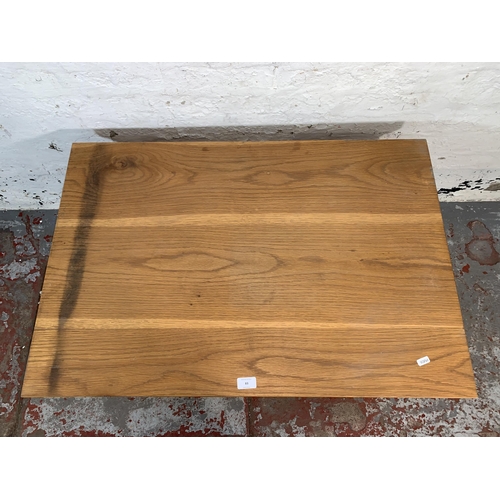 83 - A modern oak rectangular coffee table - approx. 51cm high x 62cm wide x 91cm long