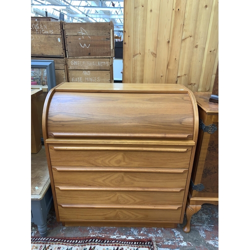 85 - A mid 20th century teak roll top bureau - approx. 100cm high x 90cm wide x 47cm deep