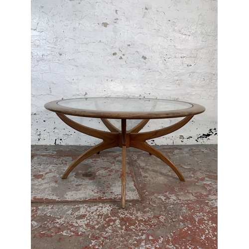 88 - A mid 20th century G Plan Astro teak and glass ‘Spider’ coffee table by Victor Wilkins - approx. 45c... 