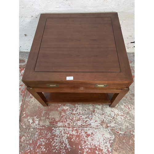 95 - A mahogany campaign style single drawer coffee table - approx. 52cm high x 65cm square