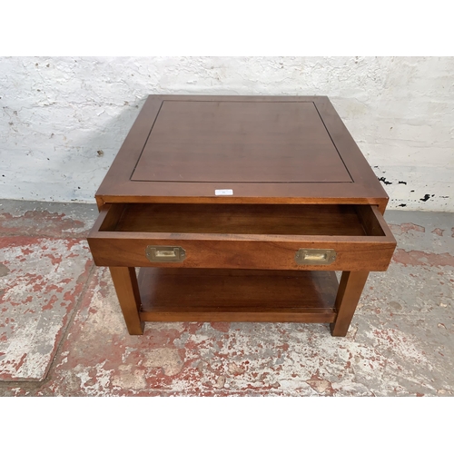 95 - A mahogany campaign style single drawer coffee table - approx. 52cm high x 65cm square