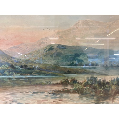 250B - A gilt framed watercolour of a landscape scene, signed lower left - approx. 72cm high x 92cm wide