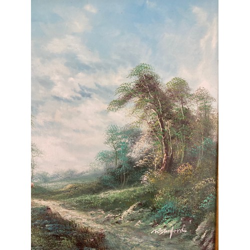 250C - A gilt framed oil on board of a countryside scene, signed R. Danford - approx. 87cm high x 116cm wid... 