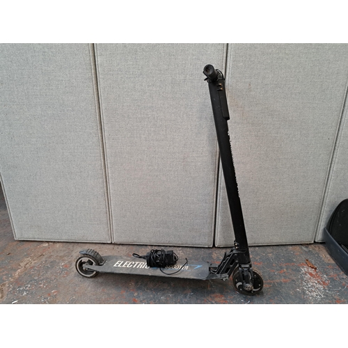 1145A - A Breezeboard Pro electric scooter with charger