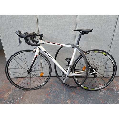 1153 - A B'twin Triban 5 road bike with Shimano brake and gear system