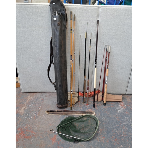 1160 - A collection of fishing items to include Shakespeare International pole, Sealey Black Arrow 2 float ... 