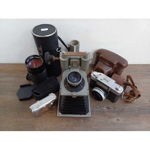 304 - Four items, one enlarger bellows fitted with Wray Supar 3 ¼