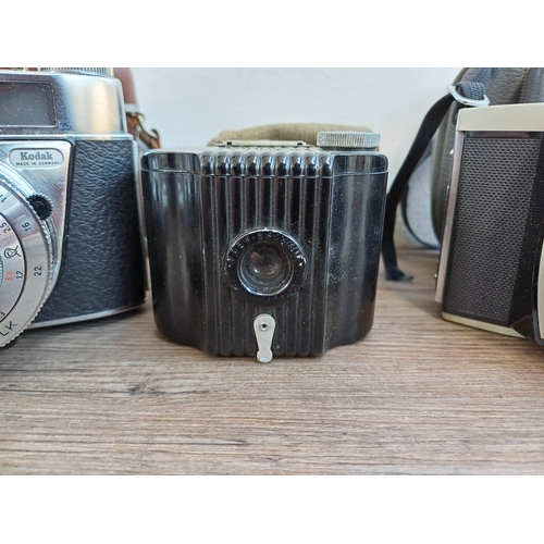 305 - Five cased Kodak cameras, Retinette IB 35mm viewfinder, Bantam Colorsnap II and 3 for 828 film, Brow... 