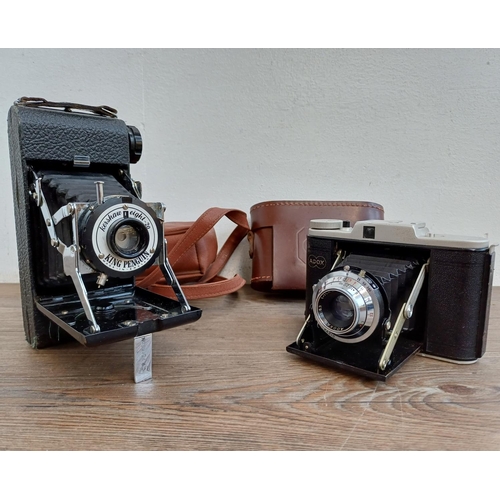 313 - Two cased folding cameras, one Adox Golf 63 6x6 viewfinder with Schleussner Adoxar f/6.3 75mm lens a... 