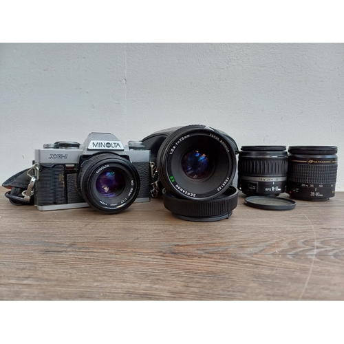 314 - Four items, one Zenza Bronica Zenzanon E II 1:2.8 f=75mm lens, one cased Minolta XG-1 35mm SLR camer... 