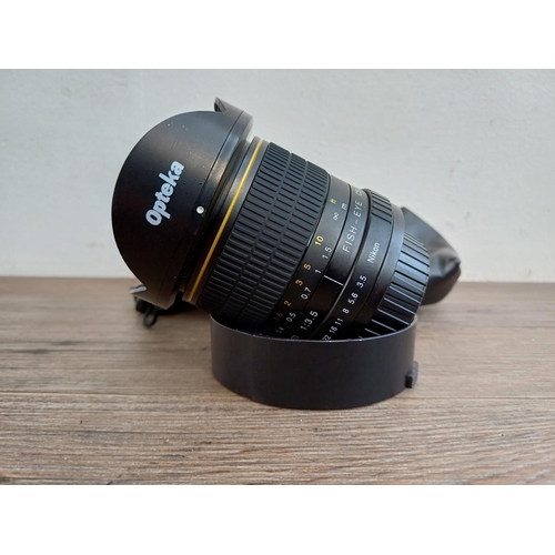 316 - A cased Opteka 6.5mm 1:3.5 fish-eye CS lens for Nikon F mount