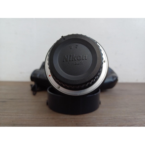 316 - A cased Opteka 6.5mm 1:3.5 fish-eye CS lens for Nikon F mount