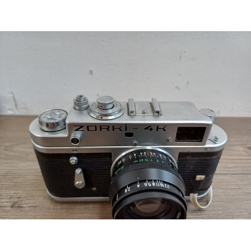 317 - A cased 1970s KMZ Zorki 4K 35mm rangefinder camera fitted with Jupiter-8 2/50 lens