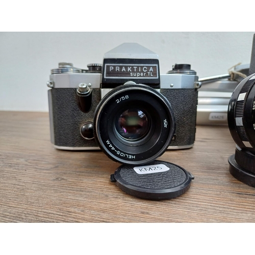 318 - Six items to include Pentacon Praktica Super TL 35mm SLR camera fitted with Helios-44M 2/58 lens, Pe... 