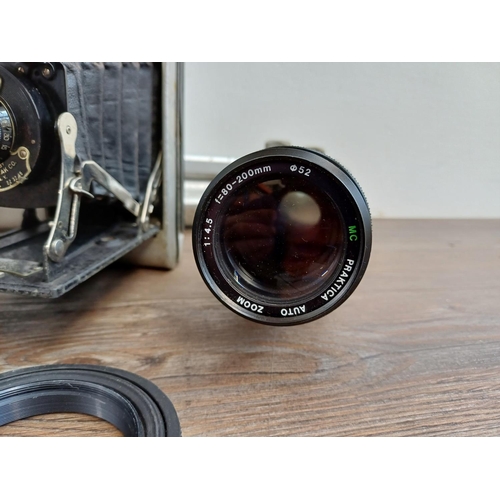 318 - Six items to include Pentacon Praktica Super TL 35mm SLR camera fitted with Helios-44M 2/58 lens, Pe... 