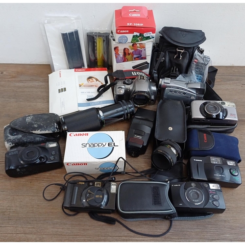 319 - A collection of Canon items to include EOS 300D 6mp DSLR camera, cased Speedlite 420EX flash, boxed ... 