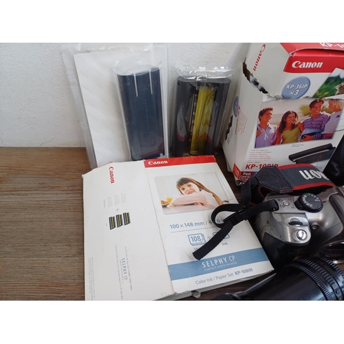 319 - A collection of Canon items to include EOS 300D 6mp DSLR camera, cased Speedlite 420EX flash, boxed ... 