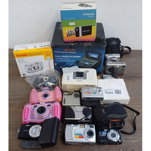 321 - A collection of digital cameras and accessories to include cased Sony Cyber-shot DSC-W810 20.1mp, Pa... 