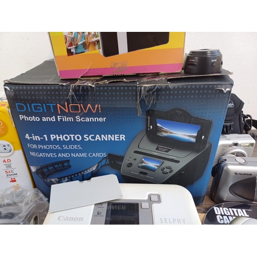 321 - A collection of digital cameras and accessories to include cased Sony Cyber-shot DSC-W810 20.1mp, Pa... 