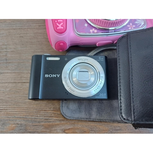 321 - A collection of digital cameras and accessories to include cased Sony Cyber-shot DSC-W810 20.1mp, Pa... 