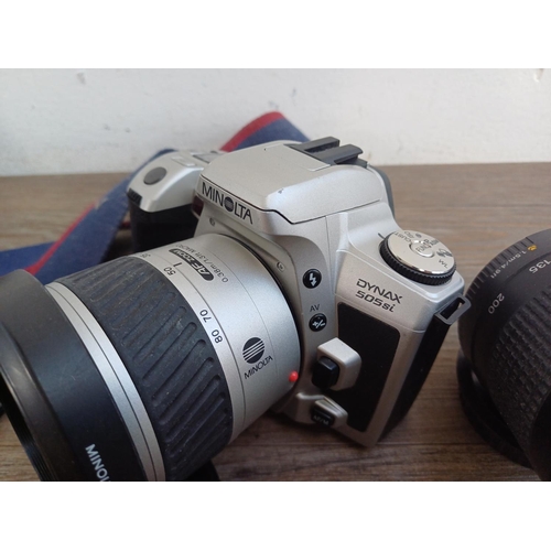 324 - Three 35mm SLR cameras, one cased Pentacon LTL fitted with 1.8/50 auto lens with instruction manual,... 