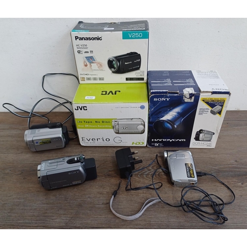 325 - Six digital camcorders to include boxed JVC Everio GZ-MG21EK HDD, boxed Panasonic V250 10mp full HD,... 