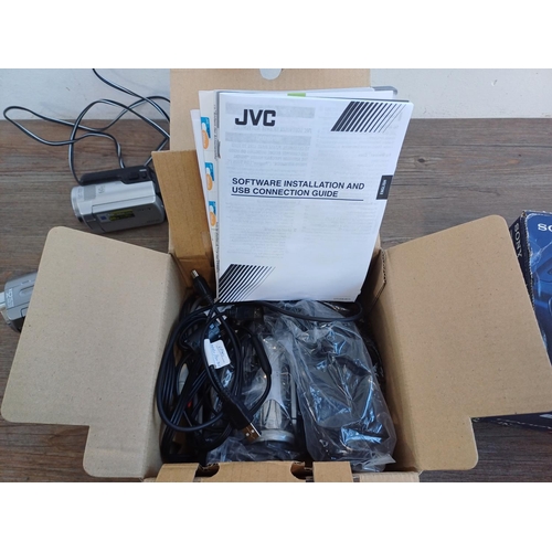 325 - Six digital camcorders to include boxed JVC Everio GZ-MG21EK HDD, boxed Panasonic V250 10mp full HD,... 