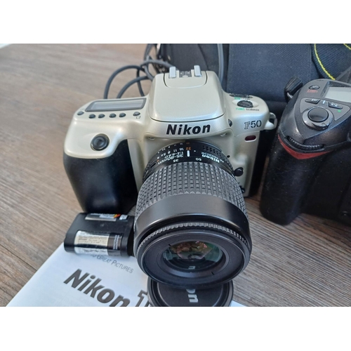 328 - A collection of Nikon items to include D70s 6mp DSLR, F50 35mm SLR, F55 35mm SLR, Speedlight SB-22 f... 