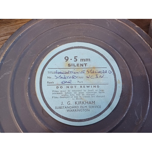 330 - A collection of items to include 9.5mm film reels marked 'News Review of 1952' and 'Liberation of St... 