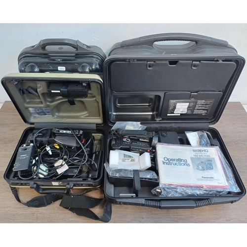 333 - Four hard cased camcorders, one Minolta 8100E, one Panasonic MC10, one JVC GR-C7E and one Panasonic ... 