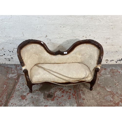 112 - A Victorian style carved mahogany and fabric upholstered doll’s double parlour sofa - approx. 49cm h... 