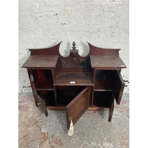 114 - An Edwardian carved mahogany wall mountable cabinet - approx. 60cm high x 73cm wide x 21cm deep