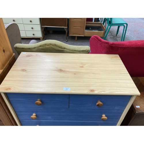 122 - A modern pine effect and blue painted chest of drawers - approx. 90cm high x 77cm wide x 40cm deep