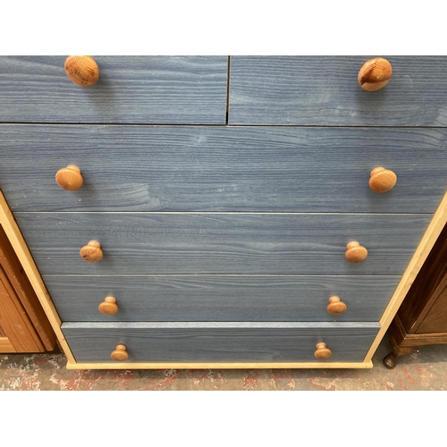 122 - A modern pine effect and blue painted chest of drawers - approx. 90cm high x 77cm wide x 40cm deep