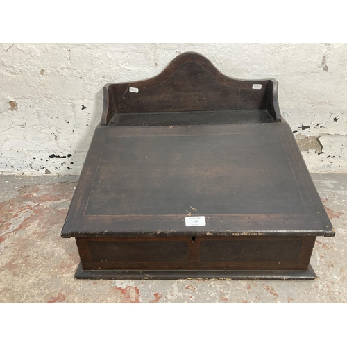 132 - A late 19th/early 20th century stained pine writing slope - approx. 40cm high x 52cm wide x 46cm dee... 