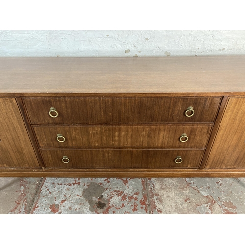 142 - A mid 20th century Greaves & Thomas teak sideboard - approx. 76cm high x 176cm wide x 43cm deep