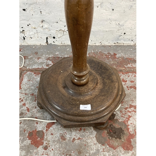 144 - A 1930s stained beech standard lamp with presentation plaque - approx. 153cm high