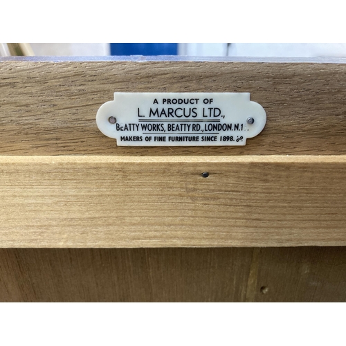 145 - An L. Marcus Ltd. carved oak linenfold dresser - approx. 184cm high x 121cm wide x 48cm deep