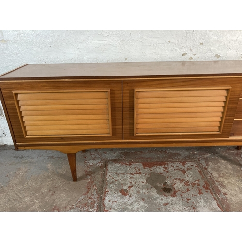 149 - A mid 20th century teak sideboard - approx. 74cm high x 199cm wide x 40cm deep