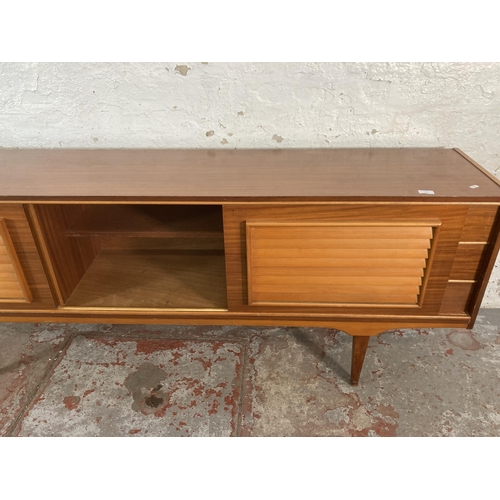 149 - A mid 20th century teak sideboard - approx. 74cm high x 199cm wide x 40cm deep