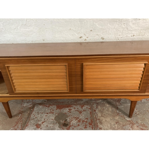 149 - A mid 20th century teak sideboard - approx. 74cm high x 199cm wide x 40cm deep