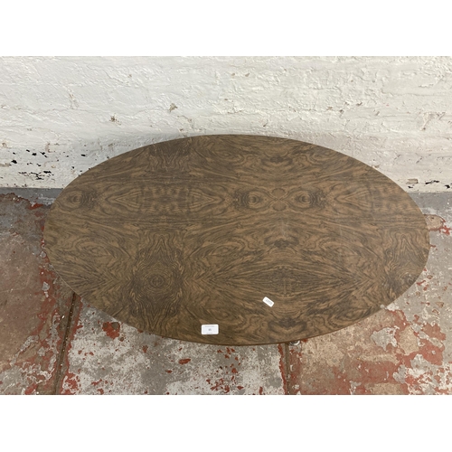 15 - A mid 20th century walnut effect and chrome plated oval pedestal side table - approx. 42cm high x 60... 