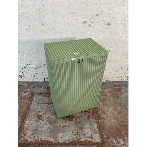 152 - A Lusty Product Lloyd Loom green painted laundry basket - approx. 68cm high x 46cm wide x 31cm deep