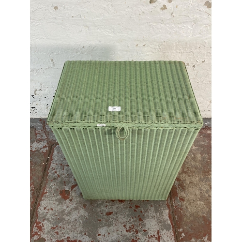 152 - A Lusty Product Lloyd Loom green painted laundry basket - approx. 68cm high x 46cm wide x 31cm deep