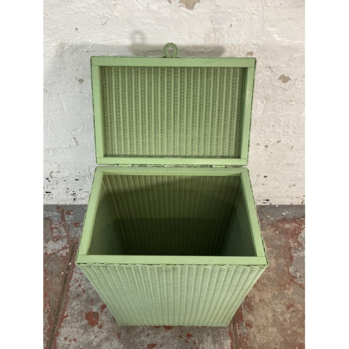 152 - A Lusty Product Lloyd Loom green painted laundry basket - approx. 68cm high x 46cm wide x 31cm deep