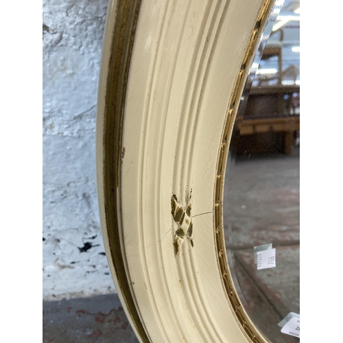 153 - A French Louis XV style white and gold painted circular bevelled edge wall mirror - approx. 77cm dim... 