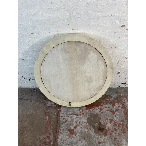 153 - A French Louis XV style white and gold painted circular bevelled edge wall mirror - approx. 77cm dim... 