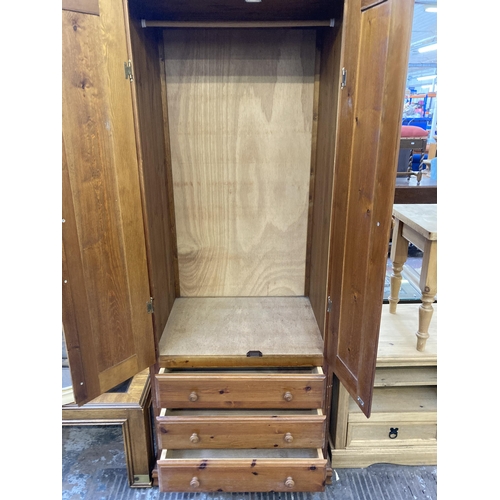 155 - A modern pine double wardrobe - approx. 189cm high x 76cm wide x 57cm deep